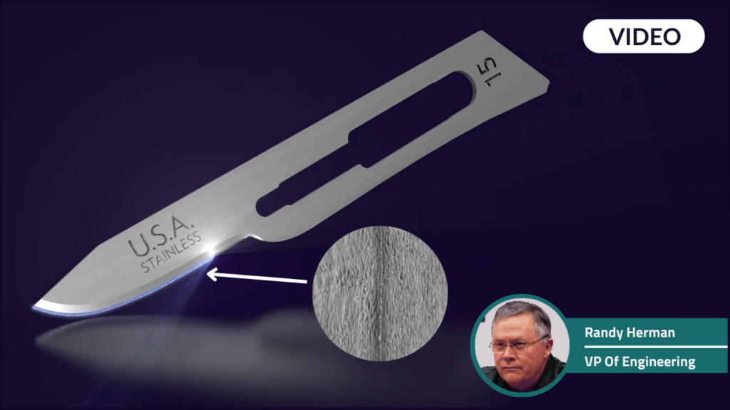 Randy Herman infront of an image of an AccuThrive #15 surgical blade with MicroCoat
