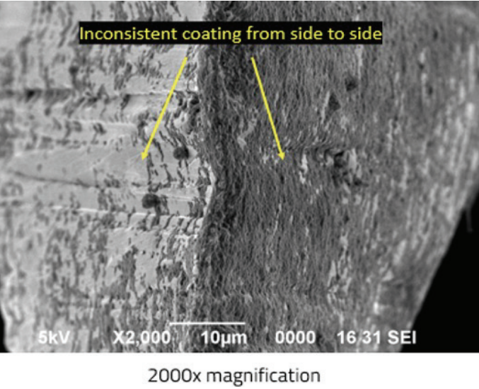 Figure 6 showing a surgical blade edge with inconsistent coating from side to side.